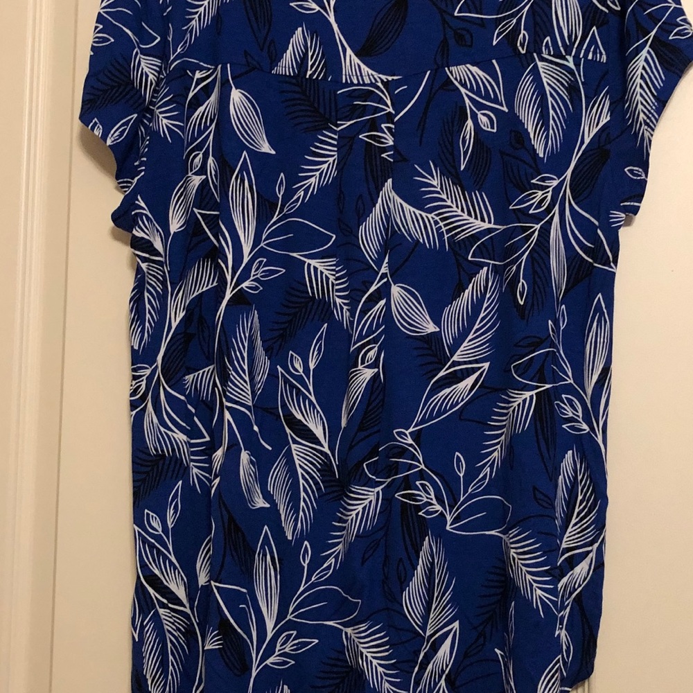 Top 96% Rayon 4% Poly. Gently worn.